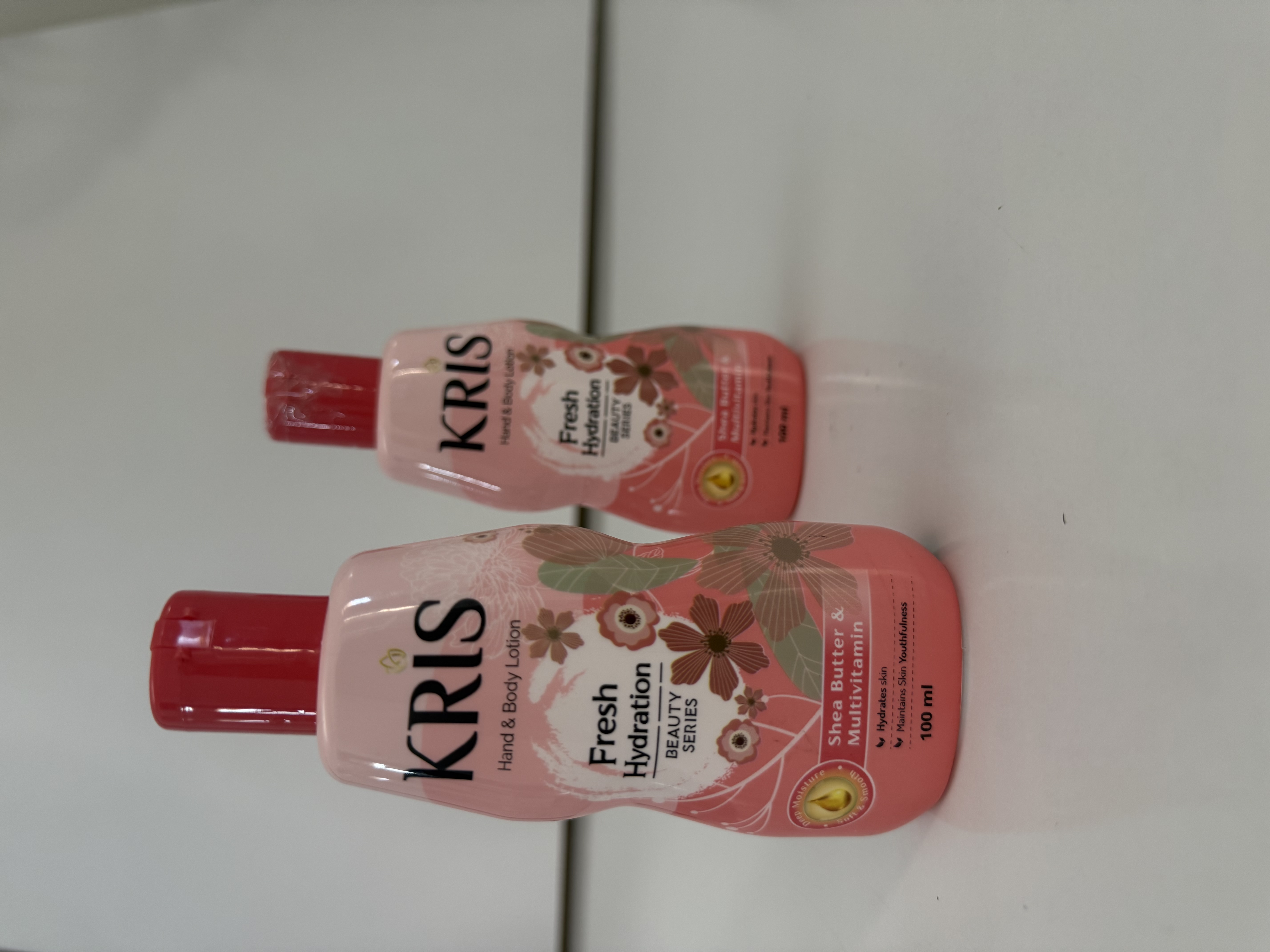 خرید لوسیون دست و بدن کریس Kris مدل Fresh Hydration رایحه رز 100میل از فروشگاه فهیمی شاپ